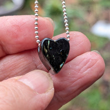 Charger l'image dans la galerie, Genuine Nuummite with rainbow flash pendant