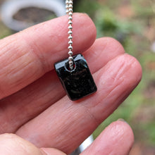 Charger l'image dans la galerie, Genuine Nuummite with rainbow flash pendant