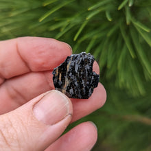 Load image into Gallery viewer, Nuummite self standing half raw half polished