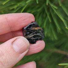 Load image into Gallery viewer, Nuummite self standing half raw half polished