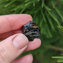 Load image into Gallery viewer, Nuummite self standing half raw half polished