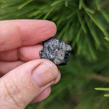 Load image into Gallery viewer, Nuummite self standing half raw half polished