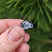 Load image into Gallery viewer, Nuummite self standing half raw half polished