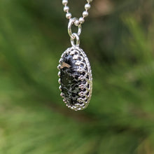 Charger l'image dans la galerie, Nuummite with magnetic Pyrrhotite inclusions in 925 silver