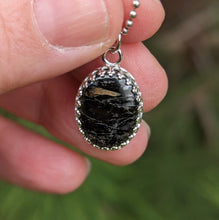 Charger l'image dans la galerie, Nuummite with magnetic Pyrrhotite inclusions in 925 silver
